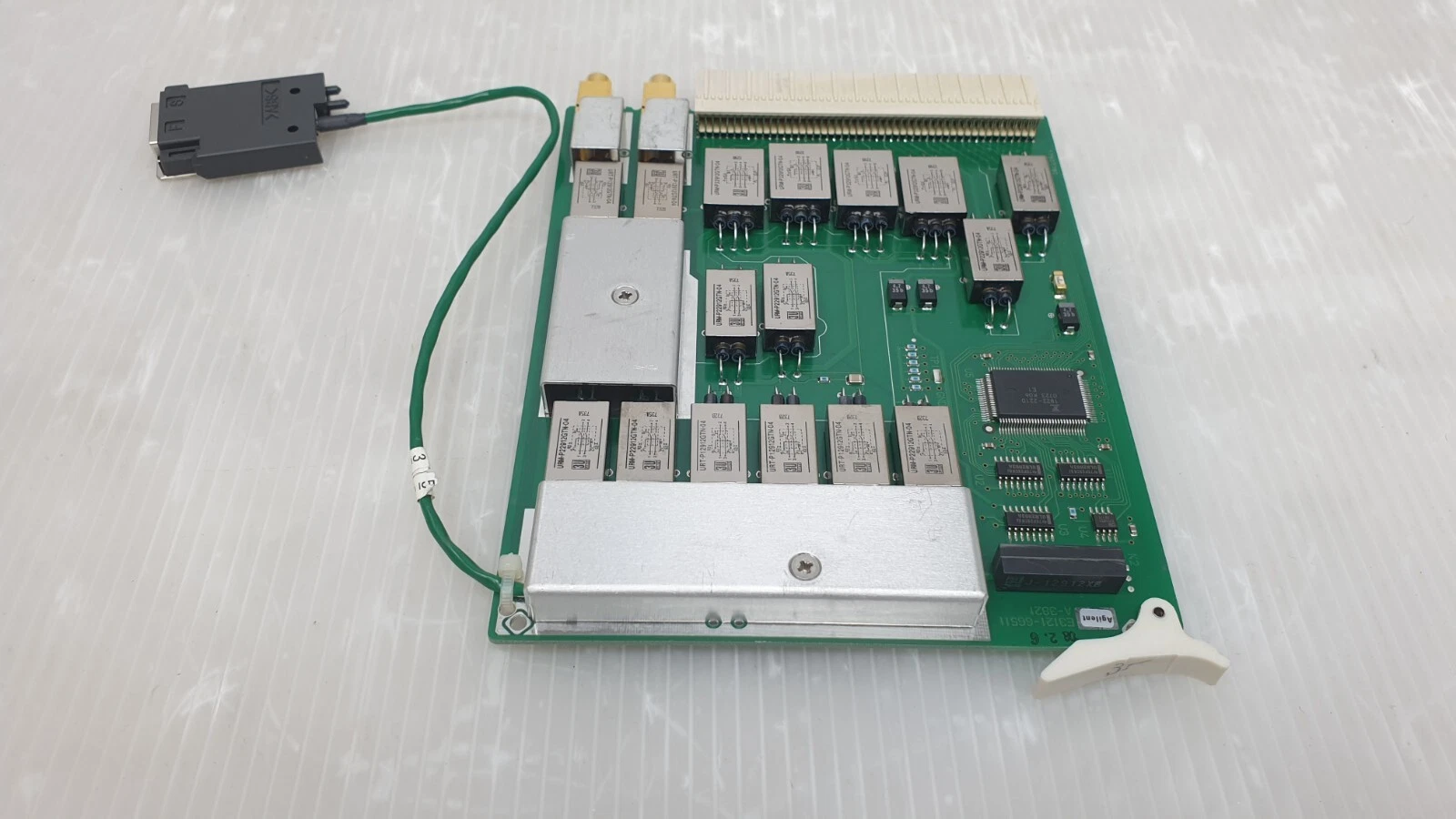 Agilent E3121-66511 front with ejector lever, Agilent logo and shield covers