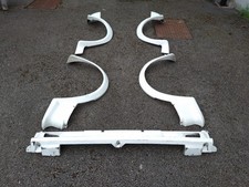 MG METRO TURBO BODY KIT.COLOUR CODED WHITE.GOOD CONDITION.4ARCHES.FRONT SPLITTER