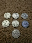 1950 Franklin Half Dollar Coin. Quantity 7.