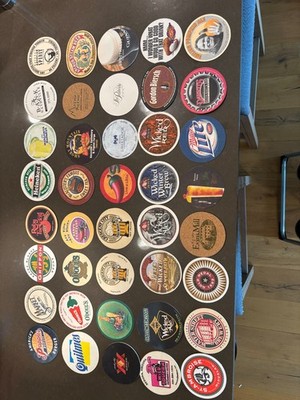 BEER AND BAR COASTERS. A GROUP OF 40 