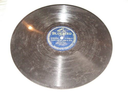 Montana Slim, Bluebird #B8983. West Of Rainbow Trail/Headin'...,78 rpm,10",VG+. - Picture 2 of 2