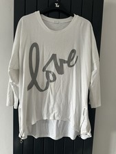 ONE SIZE WHITE TOP WITH LOVE IN SILVER LETTERS FIT UP TO SIZE 20ish LOVELY COND