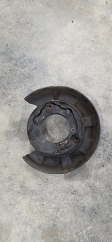 Protector antipolvo freno lateral pasajero trasero Toyota Supra MK3 86.5-92 FABRICANTE DE EQUIPOS ORIGINALES - Imagen 7 de 13