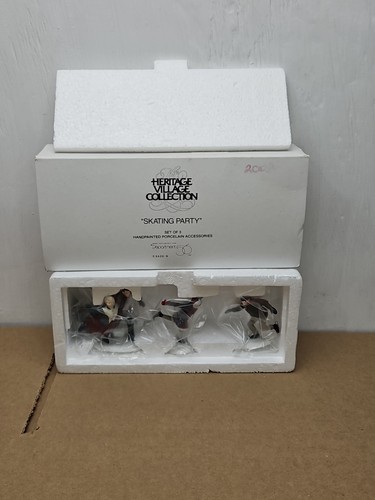 Department 56 Heritage Village skating party - Picture 1 of 24