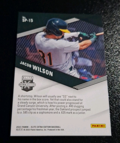 "CALIENTE" 2023 ELITE EDICIÓN EXTRA ENCUADERNADO CON HECHIZOS #SP-15 JACOB WILSON ATLETISMO CASI NUEVO-COMO NUEVO - Imagen 2 de 2