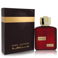 Ramz Lattafa Gold by Lattafa Eau De Parfum Spray (Unisex) 3.4 oz