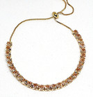 Champagne Cubic Zirconia adjustable bolo tennis bracelet 6-9 inches in goldtone
