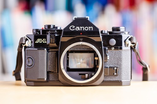 Canon A-1 + Canon 50mm f/1.8 FD + Pile Neuve A1 Black !! Super Offre !! - Photo 3/11
