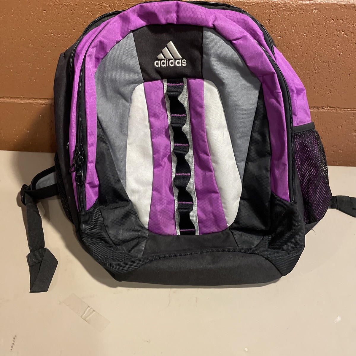Adidas black and purple load spring back pack | eBay