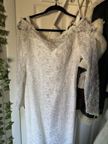 Oleg Cassini Long Sleeve Beaded Floral Wedding Dress with Train and Veil - Picture 5 of 19