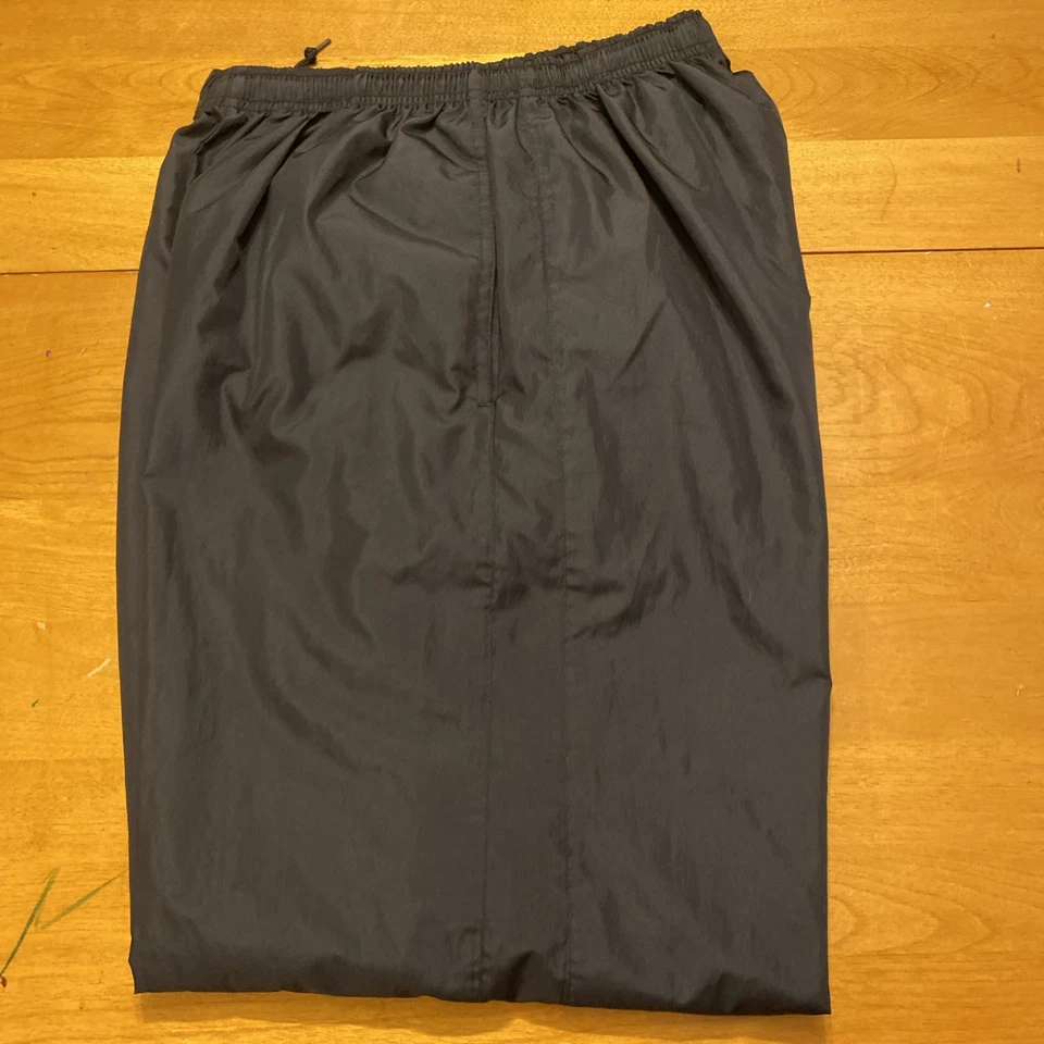 Pantalones de chándal para hombre Nike Spellout negros etiquetas faltantes cremallera tobillo talla mediana Foto 2 de 4