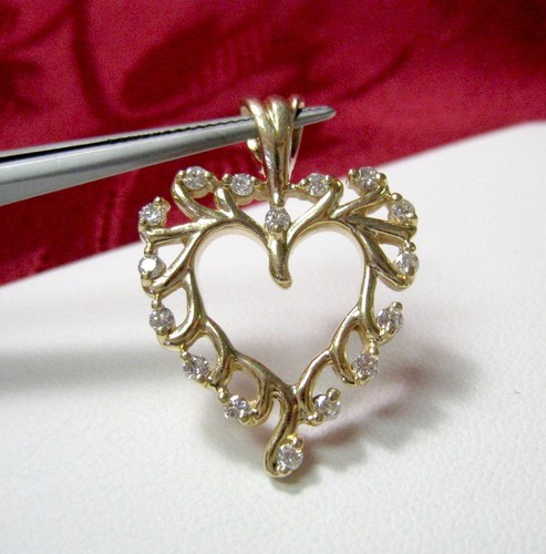 COLGANTE AMOR CORAZÓN DIAMANTE 0,48 CTW ORO AMARILLO 14K 5,4 GRAMOS - Imagen 6 de 6