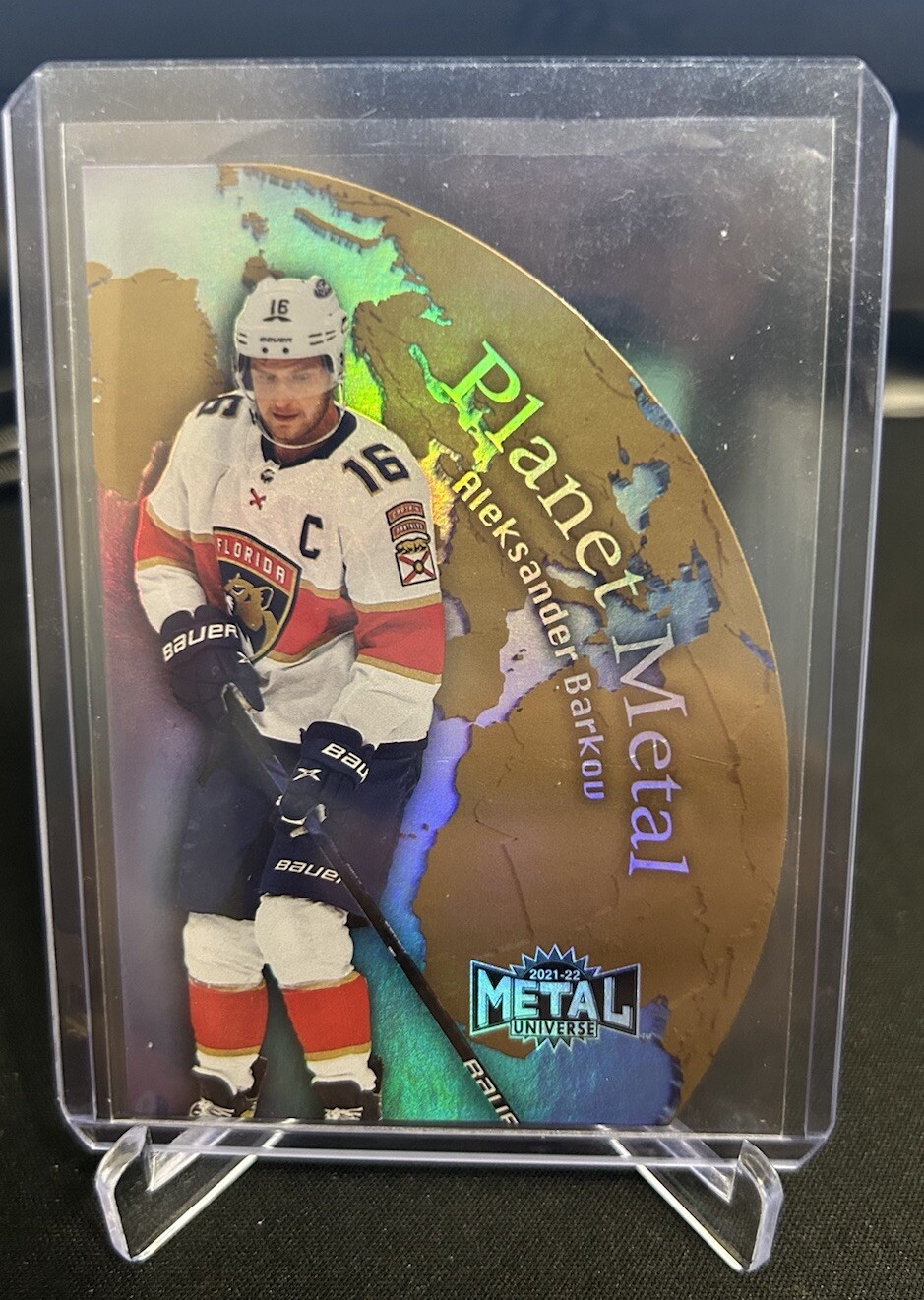 Aleksander Barkov Planet Metal Gold - 2021-22 Skybox Metal Universe