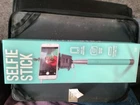 Brand new Selfie Sticks. Fits device between 2.5-3 inches wide. 