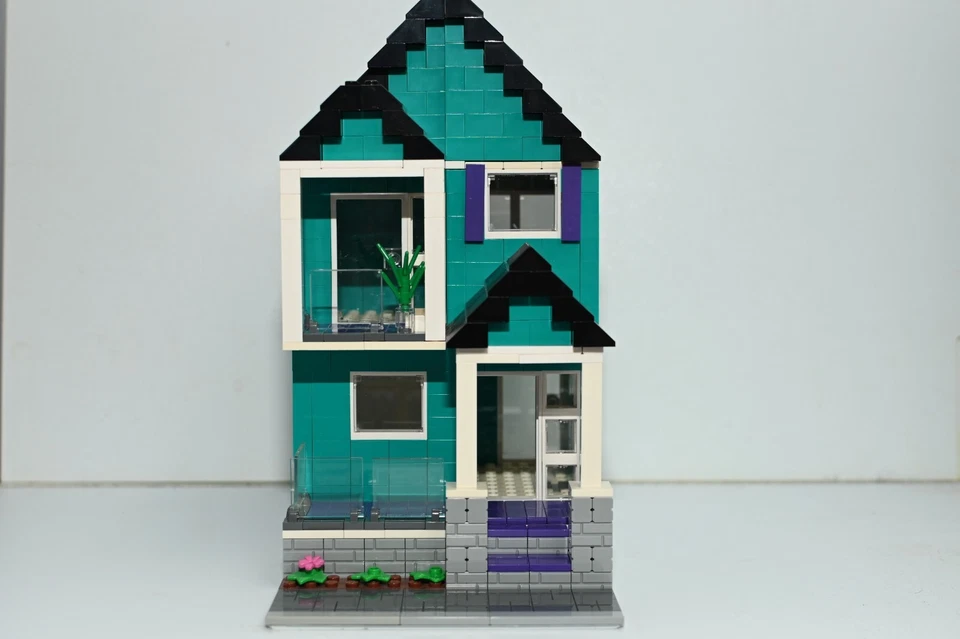 Casa de Ladrillos Turquesa Oscuro Modular Ciudad Modelo Personalizado Construido con Ladrillos Foto 2 de 4