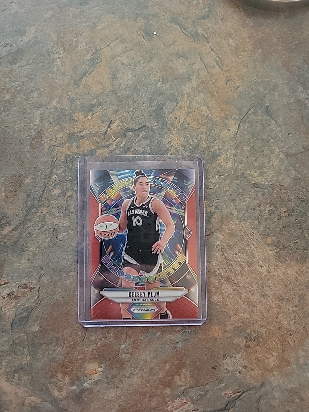 2024 Panini Prizm WNBA - Kaleidoscopic Kelsey Plum #5 Red Prizm /99