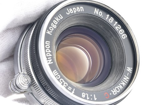 Lente Ex++ Nikon Nippon Kogaku W-NIKKOR.C 35 mm f/1,8 Japón con tapas - Imagen 7 de 10