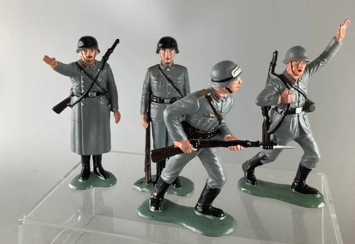 LOUIS MARX FOUR (4) WW2 6" GERMAN SOLIDERS PAINTED MADE GREAT BRITAIN ?