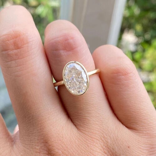Oval bezel set diamond ring Clearance