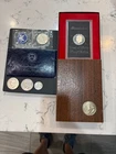 Silver dollar set. 5 silver dollars. 2 uncirculated.