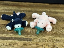 2 WubbaNub infant pacifiers, which are a combo of pacifier & small plush animal