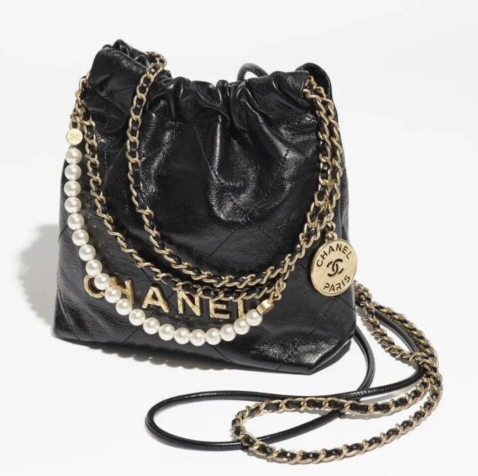 Chanel 22 mini hobo bag gold-tan calfskin