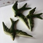 glazed hunter green ceramic swallows, a traditional Portuguese wall decor
