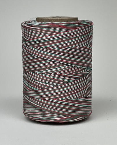 100% POLYESTER THREAD 1200 YDS BY THE SPOOL - RED/WHITE/GREEN VERIEGATED - Picture 1 of 2