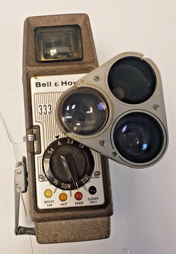 Appareil photo argentique 8 mm Bell & Howell 333 avec étui cuir vintage - Photo 2/10