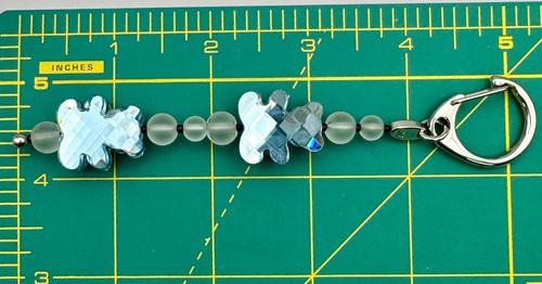 Porte-clés ours en cristal bleu Swarovski avec perles givrées clip argent cygne signé achat