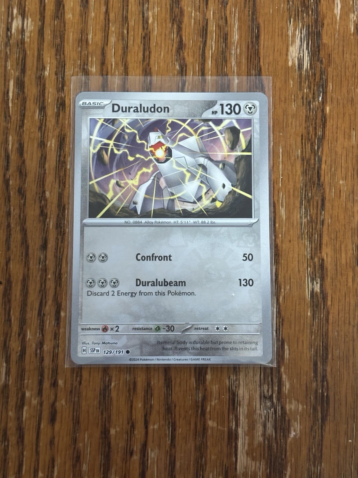 Pokémon TCG Duraludon 129/191 Surging Sparks Reverse Holo Common NM