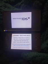 Nintendo DSi XL Launch Edition 256MB Handheld System - Burgundy