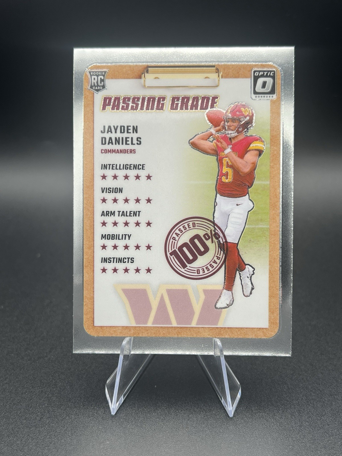 2024 Panini Donruss Optic - Passing Grade Jayden Daniels #2 (RC)