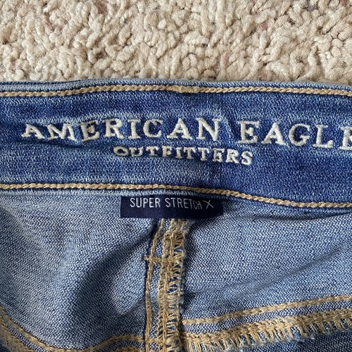 Pantalones de mezclilla American Eagle talla 0 súper elásticos de tiro alto desgastados ajustados azules - Imagen 3 de 10