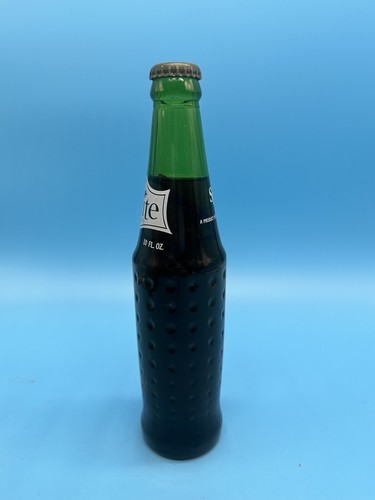 Botella de refresco Sprite Wind Cave de colección caballo interior con hoyuelos completos - Imagen 10 de 14