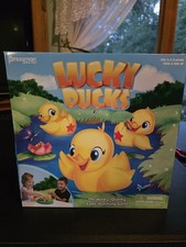 Pressman Lucky Ducks The Memory and Matching Game  box is warped from weight 