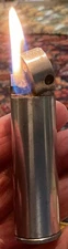 Vintage Cylindrical Aluminum Block Lighter In Resin Stand / Works Great.