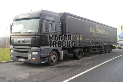LKW Foto MAN TGA 41.480 XXL Planensattelzug Deutschland grau Bruhn willy #b3ec