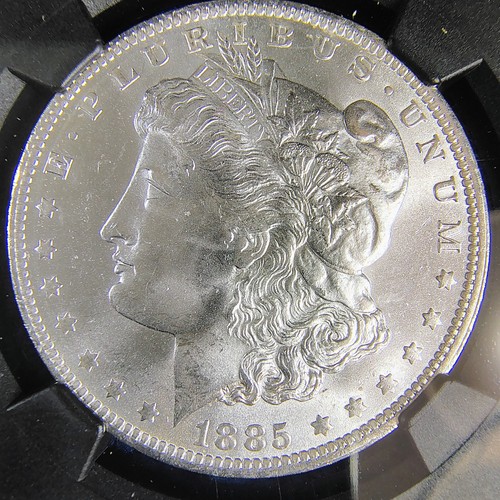 Dólar de plata Morgan 1885-O $1 - Nueva Orleans - Fragmento de bolsa original - NGC MS 63 - Imagen 6 de 19