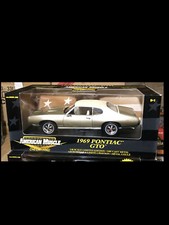 1969 Pontiac GTO Champagne Gold 1:18 Ertl American Muscle 32962