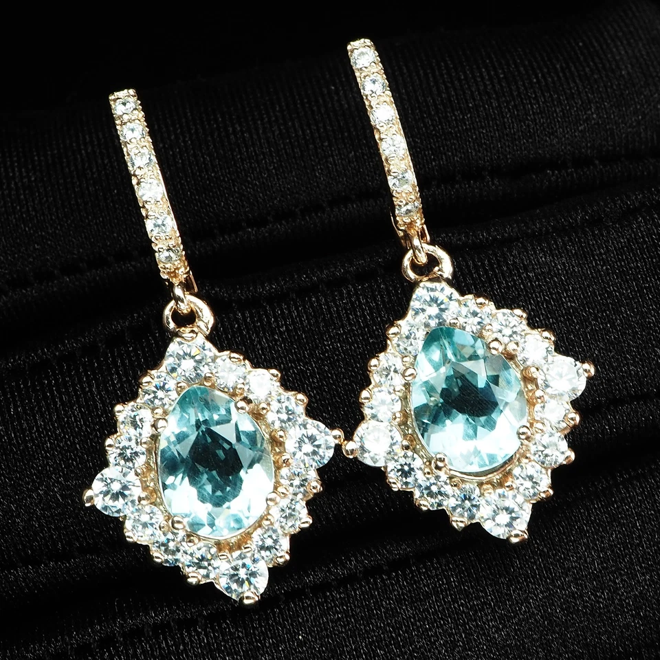 Pendientes de oro rosa de plata de ley 925 de 4,02 quilates y aguamarina azul cristal aterciopelado Foto 2 de 4