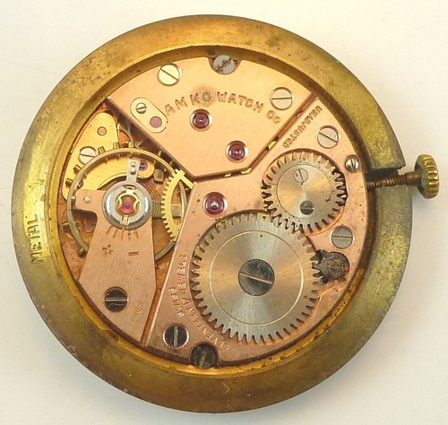 AMKO Armbanduhrwerk - gute Unruh - Teile / Reparatur - Bild 1 von 4