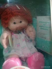 vintage very rare cabbage patch kid. never taken out of box. red head w/braces