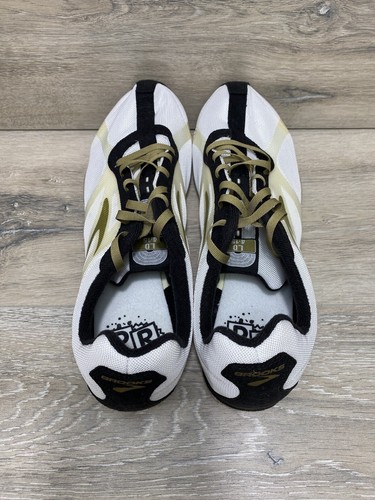 Zapatos de atletismo Brooks blancos dorados negros para hombre talla 11,5 M negros - Imagen 7 de 12