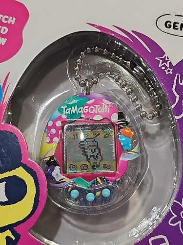 Nuevo Sellado El Original Tamagotchi Gen 1 Bonita Fiesta Virtual Mascota Multicolor - Imagen 2 de 3