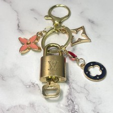 Louis Vuitton Lock  Key 306 w a Pink Flower  Monogram-Inspired Charm Keychain