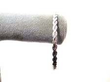 Silver Tone Bangle Bracelet with a Weave Pattern 2 3/4" Diameter