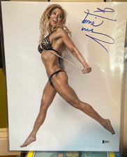TORRIE WILSON AUTOGRAPHED  PHOTO BECKETT  WCW/WWE/WWF 11 X 14