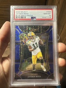 2023 Panini Select - Suite Level Jayden Reed #434 Blue Disco Prizm /25 (RC)