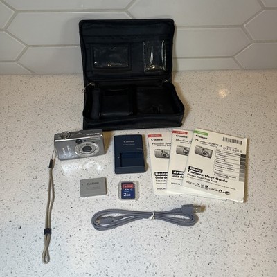 Canon Digital IXUS 800 IS 7.1MP Compact Digital Camera W/ Charger Battery Bundle